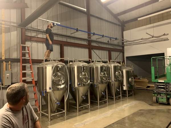 Brewhouse with stainless fermentation tanks