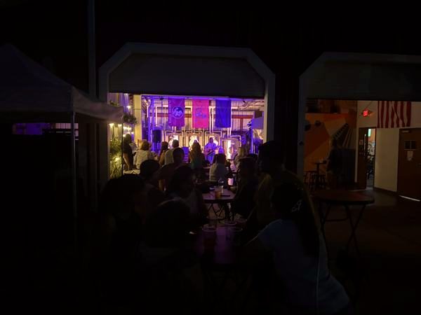 Garage doors lit purple at night
