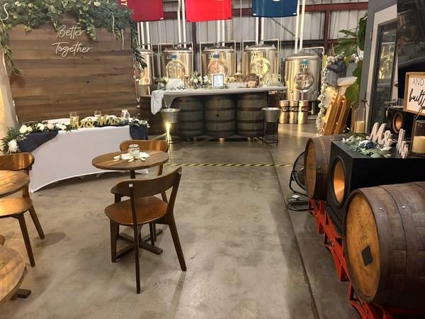 Garage room with barrels and tables set up